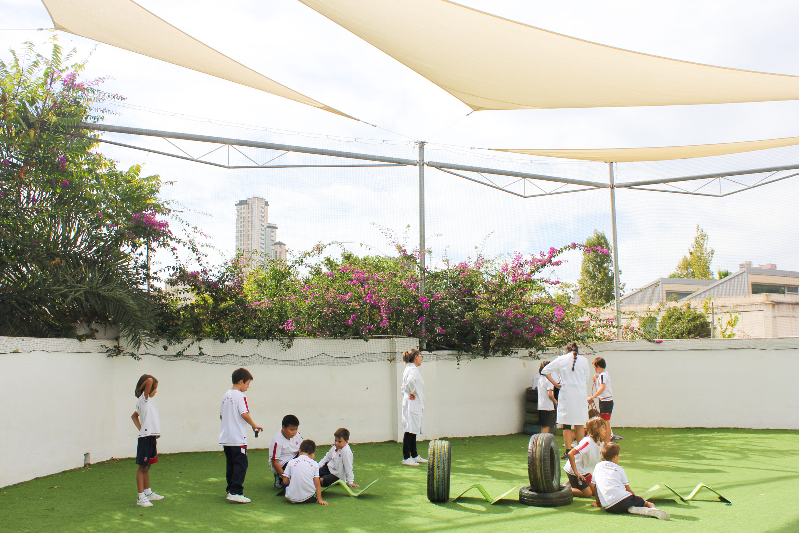 Improvements to playground facilities shaded areas artificial turf Lope de Vega School